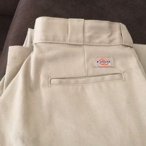 Dickies work pants in khaki.
